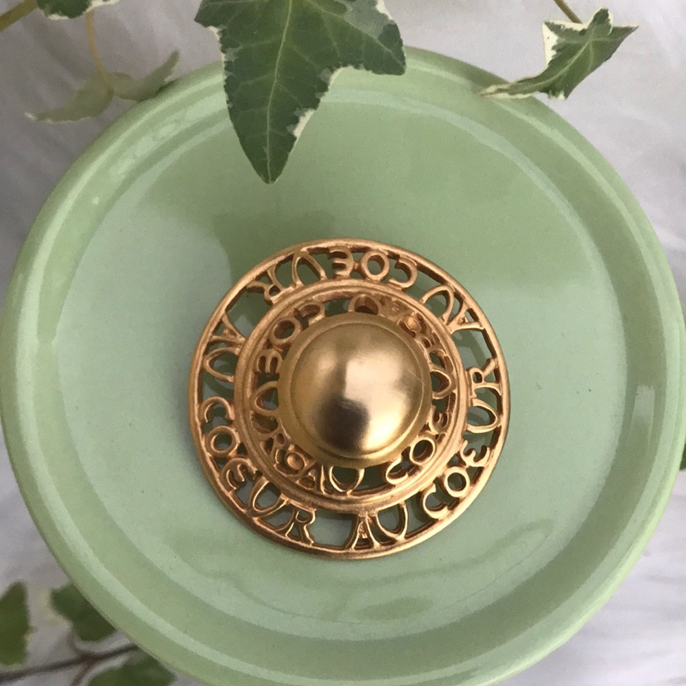Vintage gold tone brooch